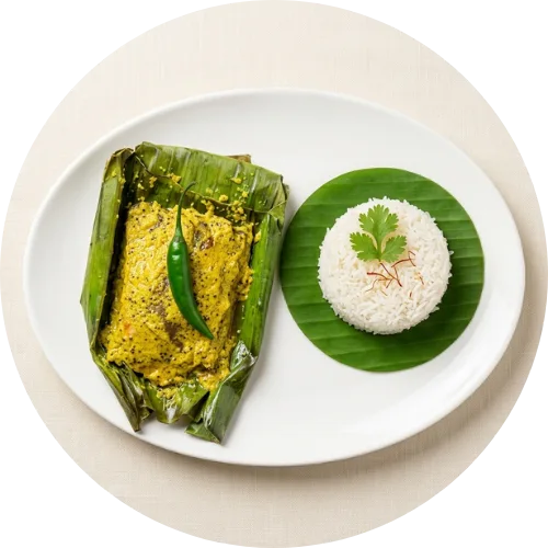 Traditional Ilish Paturi wrapped in banana leaf served during Sundarban Hilsa Festival